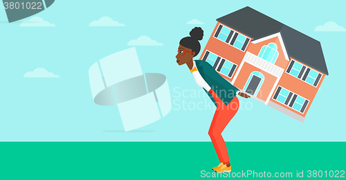 Image of Woman carrying house.