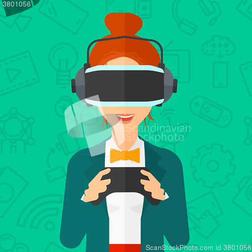 Image of Woman wearing virtual reality headset.