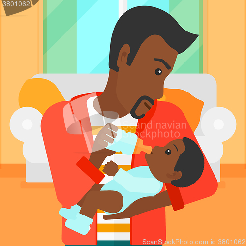 Image of Man feeding baby.