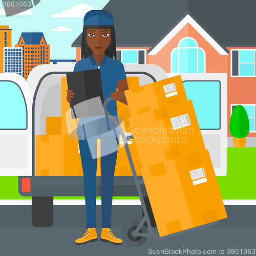 Image of Woman delivering boxes.