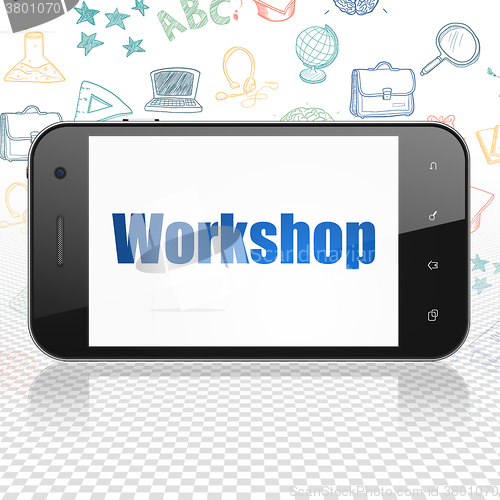 Image of Education concept: Smartphone with Workshop on display
