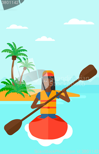 Image of Woman riding in canoe.