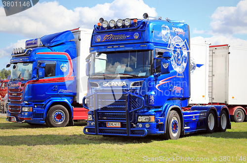 Image of Two Blue Scania Show Trucks