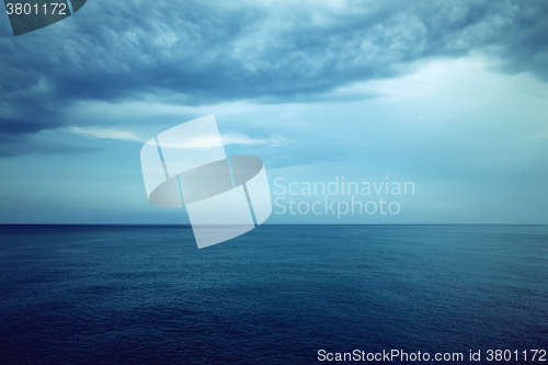 Image of Dark blue sea and stormy clouds