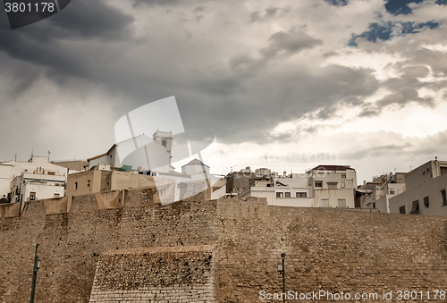 Image of Dramatic sky over the houses of Peniscola, Spain