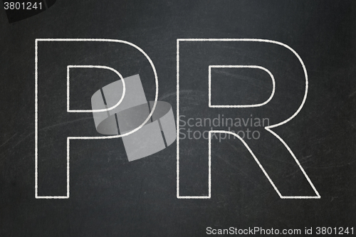 Image of Advertising concept: PR on chalkboard background