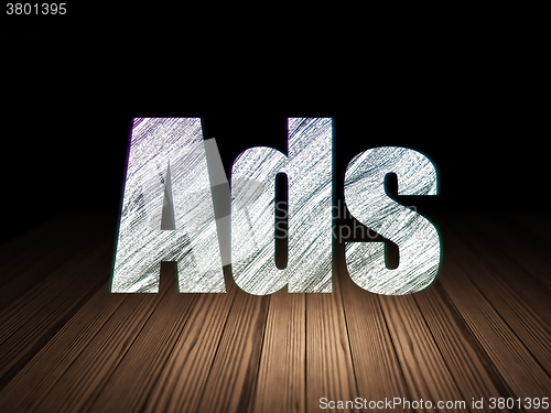 Image of Advertising concept: Ads in grunge dark room