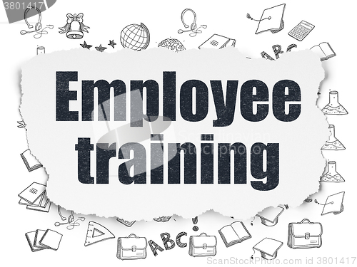 Image of Education concept: Employee Training on Torn Paper background