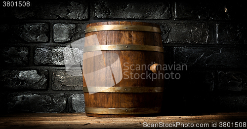 Image of Barrel and brick wall