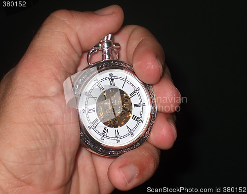 Image of holding the time