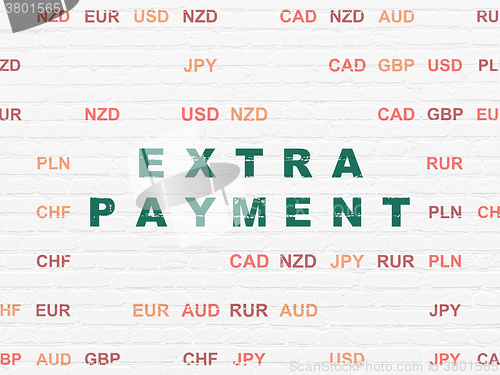 Image of Currency concept: Extra Payment on wall background