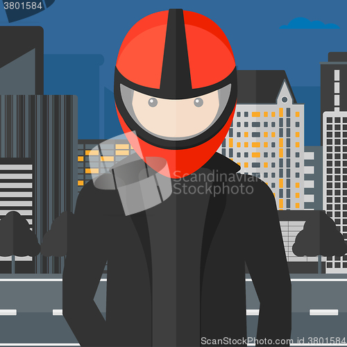 Image of Man in biker helmet.