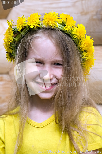 Image of little girl in dandelion crown