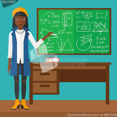 Image of Woman with chalk in hand.