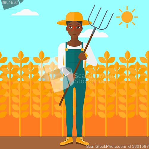 Image of Farmer with pitchfork.