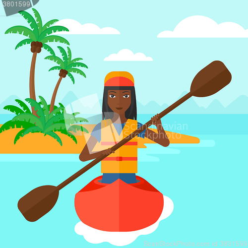 Image of Woman riding in canoe.