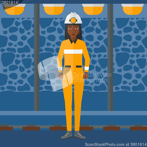 Image of Confident miner in hardhat.