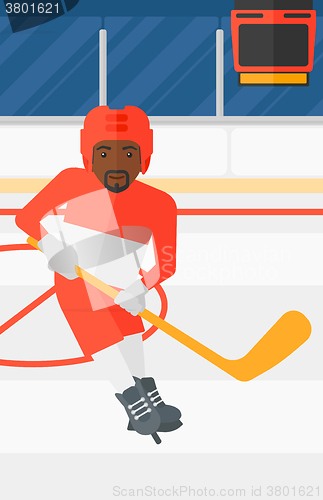 Image of Ice-hockey player with stick.