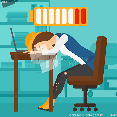 Image of Employee sleeping at workplace.