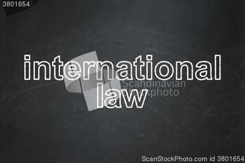 Image of Political concept: International Law on chalkboard background