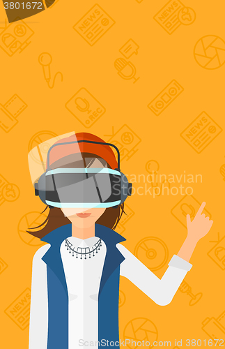Image of Woman wearing virtual reality headset.