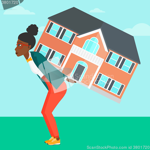 Image of Woman carrying house.