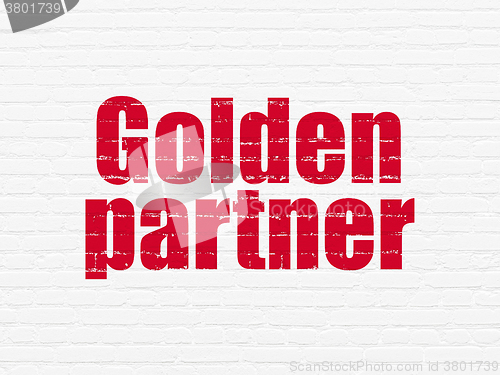 Image of Finance concept: Golden Partner on wall background