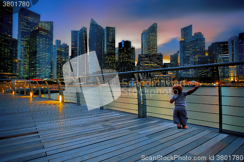 Image of Little boy in a big city 