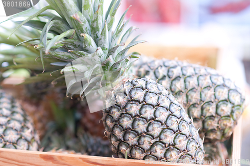 Image of pineapples in box