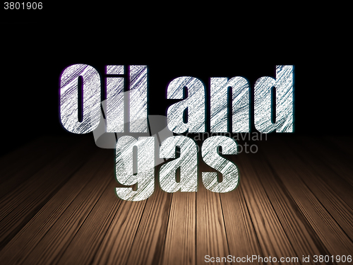 Image of Industry concept: Oil and Gas in grunge dark room