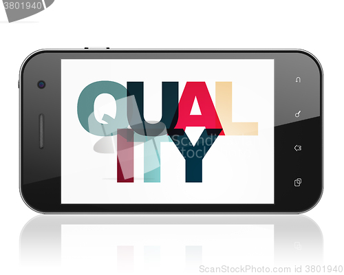 Image of Marketing concept: Smartphone with Quality on  display