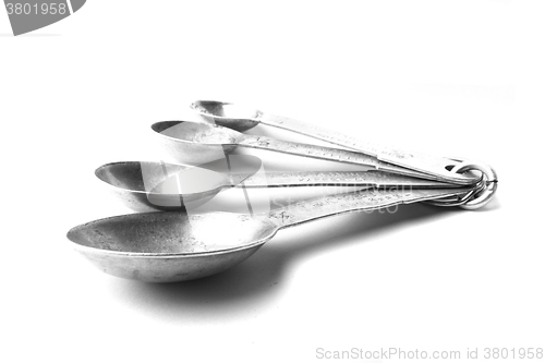 Image of old aluminum spoon set