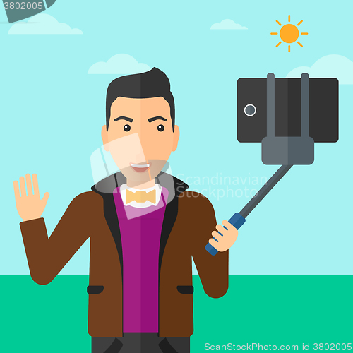 Image of Man making selfie.