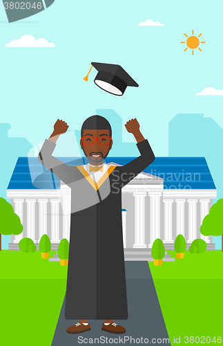 Image of Graduate throwing up his hat.