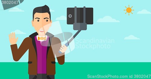 Image of Man making selfie.