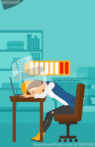 Image of Employee sleeping at workplace.