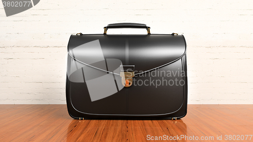 Image of Office desk table with briefcase