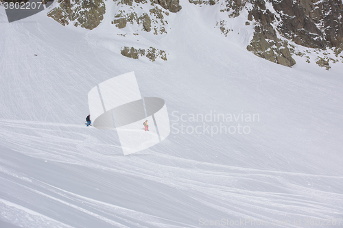 Image of freeride skier skiing in deep powder snow