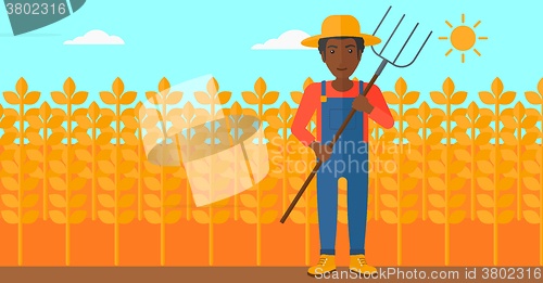 Image of Farmer with pitchfork.