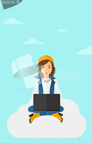 Image of Woman working on laptop.