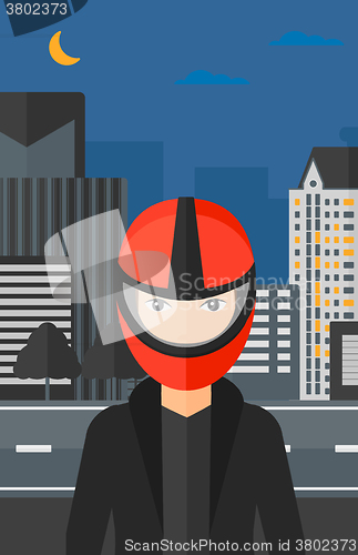 Image of Woman in biker helmet.