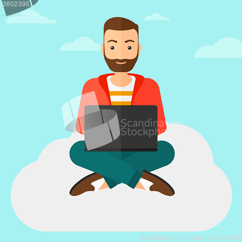 Image of Man working on laptop.