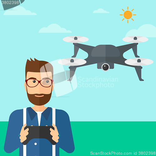 Image of Man flying drone.