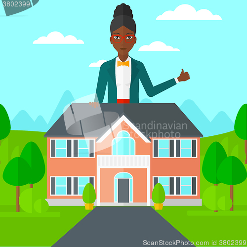 Image of Real estate agent showing thumb up.