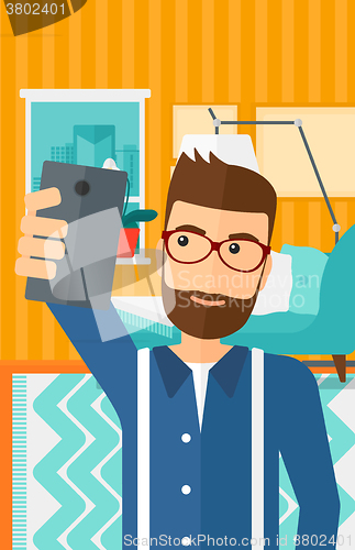 Image of Man making selfie.
