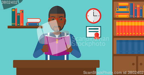 Image of Man reading book.
