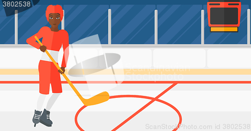 Image of Ice-hockey player with stick.