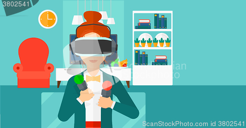 Image of Woman wearing virtual reality headset.