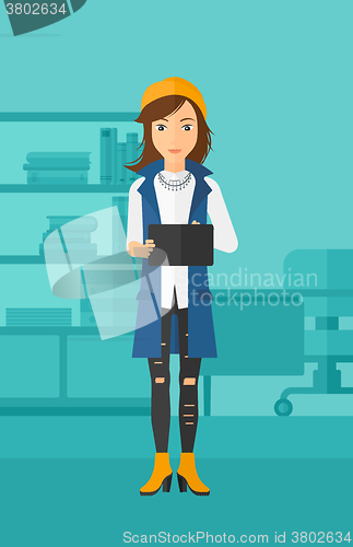 Image of Woman using tablet computer.