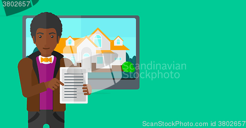 Image of Real estate agent offering house.